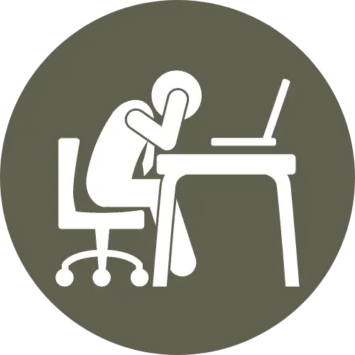 White pictogram of a slumped person with head in hands, seated at a desk with a laptop, on a dark olive circle.